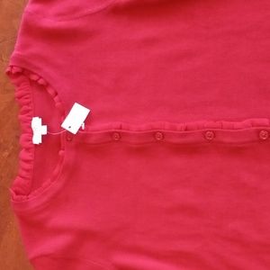 Red Talbot's button up sweater with ruffled edge.